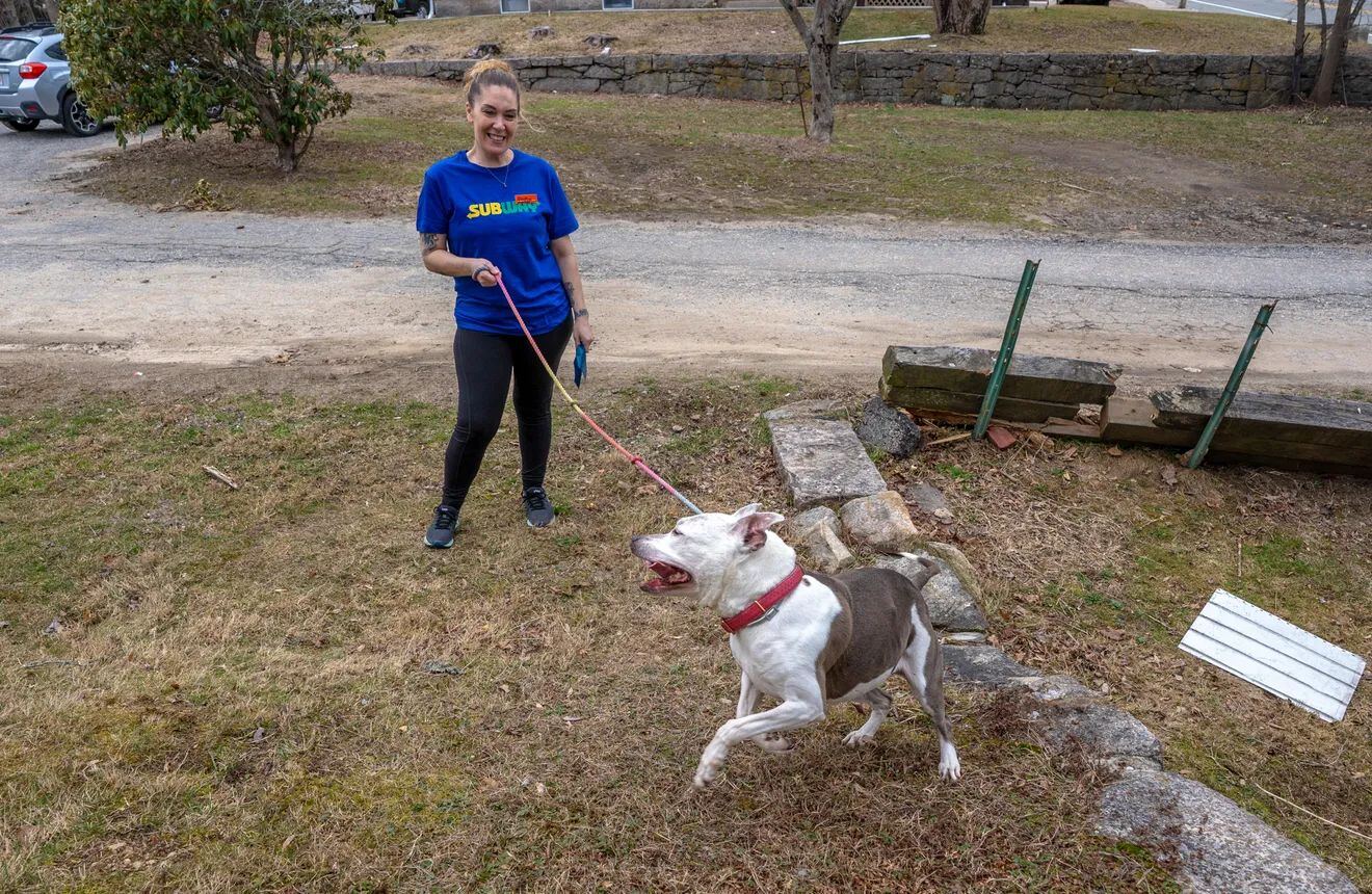 Jessica Massarone with her dog Gracie, photographed for the Providence Journal